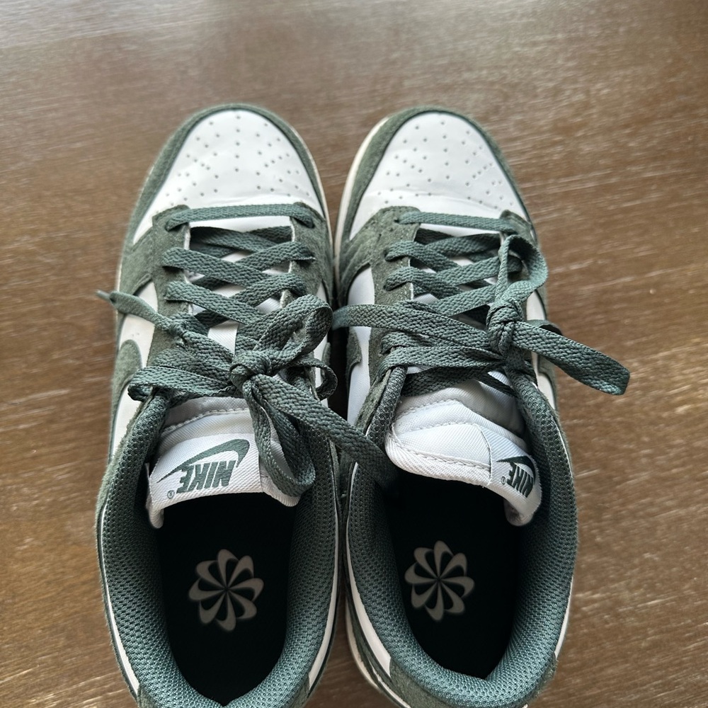 Nike Green and White Athletic Shoes with Unique Tread